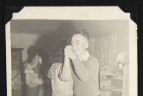Eddie dancing with a partner (ddr-densho-542-623)