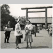 Two women in front of a Torii at Yasukuni Shrine (ddr-densho-494-10)