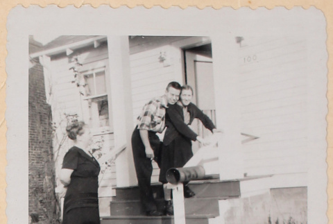 Film strip photo of a couple and a woman (ddr-densho-483-434)