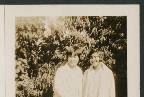 two women in a yard (ddr-densho-378-867)
