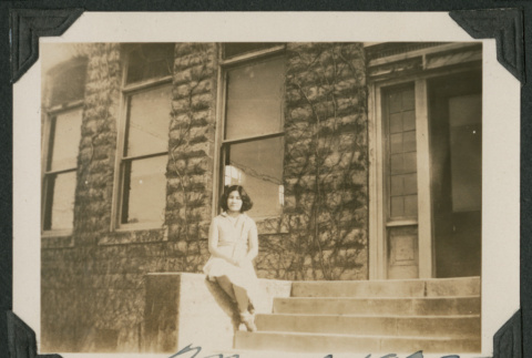 woman sitting on ledge (ddr-densho-378-570)