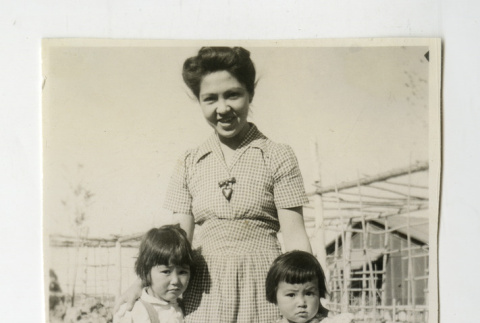 Yukie Masukawa and her children at the Poston camp (ddr-csujad-38-206)
