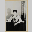 Man in armchair smoking a pipe (ddr-densho-287-728)