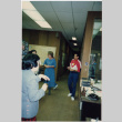 Group standing in office (ddr-densho-426-385)