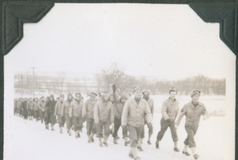 Lines of men marching in snow (ddr-ajah-2-455)