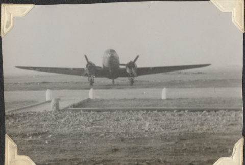 Plane on runway (ddr-densho-466-876)