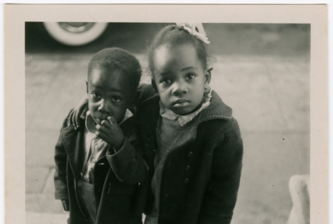 Two children standing on steps (ddr-densho-426-1396)