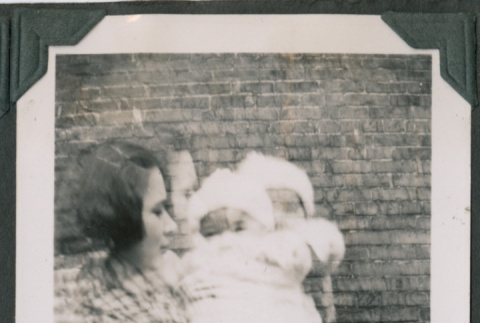 Photo of Mary Fukuyama holding infant Kenji Ima (ddr-densho-483-948)