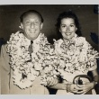 A man and woman wearing leis (ddr-njpa-1-1161)