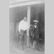 Tom and Fujitaro Kubota in front of the family house (ddr-densho-354-87)