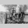 Man on a tractor (ddr-densho-187-17)