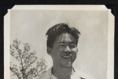 Portrait of a smiling man (ddr-densho-542-719)