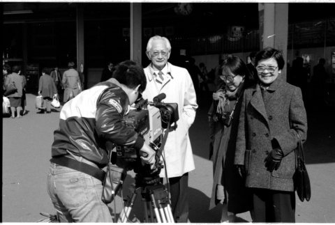 Harry Fukuhara, Loni Ding, one other, and cameraman (ddr-densho-1007-1179)