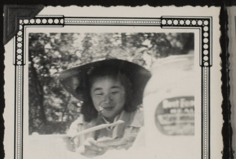 Sue at a campsite (ddr-densho-542-384)