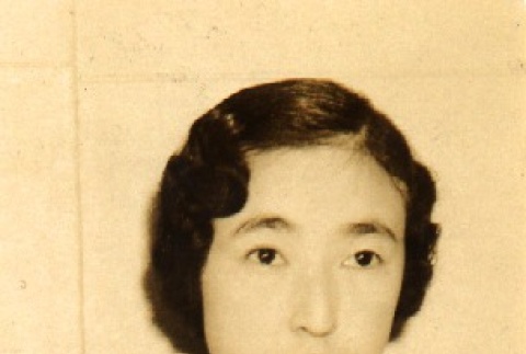 Woman wearing leis (ddr-njpa-4-2442)