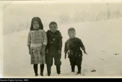 Three children in the snow (ddr-densho-174-17)