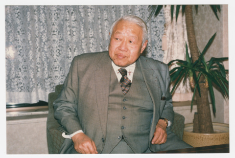 Masaru Ogawa in chair (ddr-densho-1007-408)