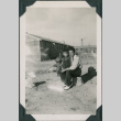 Man and child in camp (ddr-densho-483-1110)
