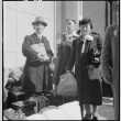 Japanese Americans waiting with baggage (ddr-densho-151-104)