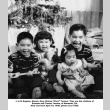 Four children by Christmas tree (ddr-ajah-6-952)