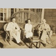 Charles and Anne Lindbergh seated with another man (ddr-njpa-1-1181)