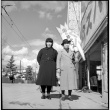 Woman and girl standing in street (ddr-densho-426-273)