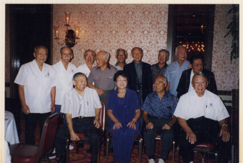Group posing for photo (ddr-densho-466-584)