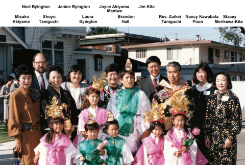 Group posing for photo, including children in costume, for 75th Anniversary of Buddhist Temple of Alameda (ddr-densho-512-134)