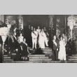 A king and queen of Aloha Week gathered with others in formal dress (ddr-njpa-2-500)