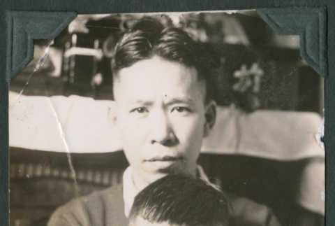 Photo of a man and child (ddr-densho-483-959)