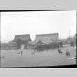 Large field outside gate and building (ddr-densho-426-2330)
