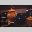 Display of enamelware pots and cups (ddr-densho-426-348)