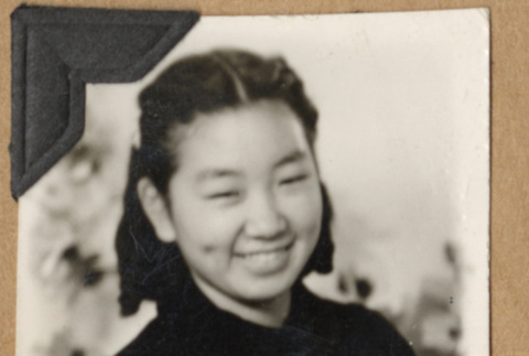 Portrait of a girl in a dark coat (ddr-densho-542-202)