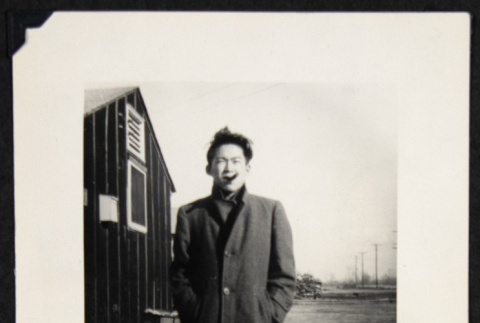 Man smoking a cigar (ddr-densho-542-632)