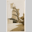 Boardwalk with large round tower and American flag (ddr-densho-426-2036)
