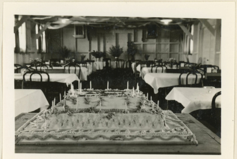 Mr. Bennett's birthday cake with candles (ddr-densho-37-1410)
