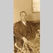 Man seated in a chair (ddr-njpa-4-2689)
