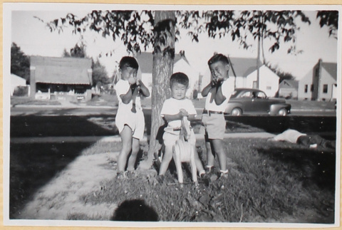 Three boys with toys (ddr-densho-522-75)
