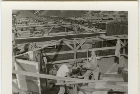 Japanese American soldiers doing laundry (ddr-densho-201-169)