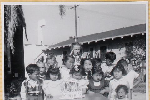 Group of children with birthday cake (ddr-densho-522-331)