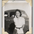 Woman standing next to car (ddr-densho-466-887)