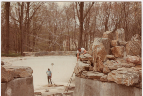 Cleaning up pool bottom (ddr-densho-377-1848)