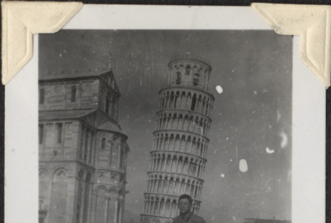 Man standing by the Leaning Tower of Pisa (ddr-densho-466-791)