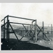 Barbed wire fence at Dachau concentration camp (ddr-densho-22-110)