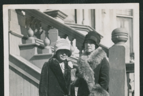 two women in front of the house (ddr-densho-378-352)