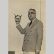 Gregg M. Sinclair holding Noh mask (ddr-njpa-2-1158)