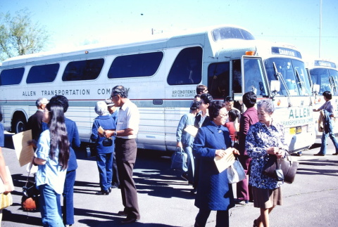 Pilgrims arriving on buses (ddr-densho-294-30)