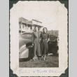 Two women next to car (ddr-densho-316-357)