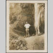 Man by waterfall (ddr-densho-316-254)
