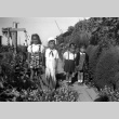 Four children in a garden (ddr-densho-34-109)